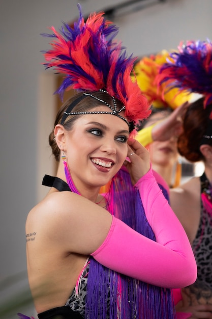 Female cabaret performers getting ready backstage