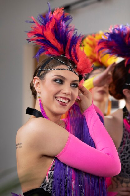 Female cabaret performers getting ready backstage