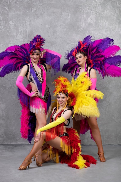 Free photo female cabaret performers posing together backstage