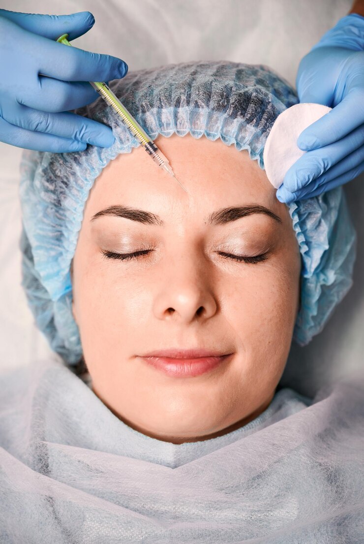 Free Photo female client getting beauty injection at wellness center
