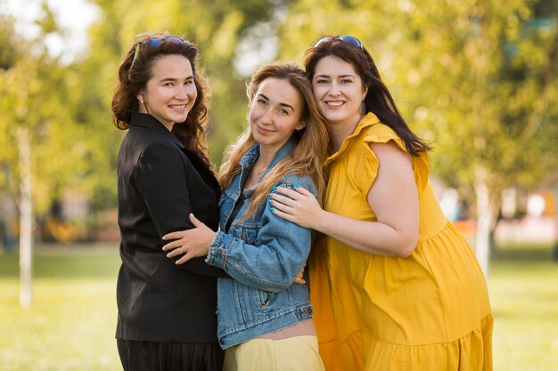 Female colleagues posing together