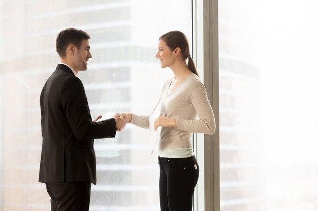 Female company secretary meeting client in office