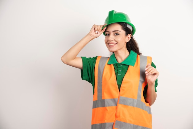 Female construction site engineer with helmet . High quality photo