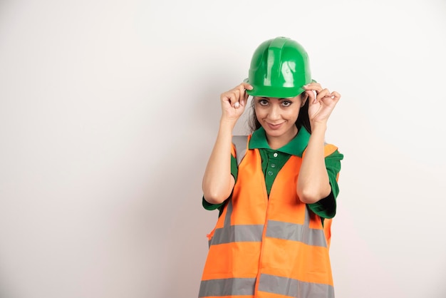 Female construction site engineer with helmet . High quality photo