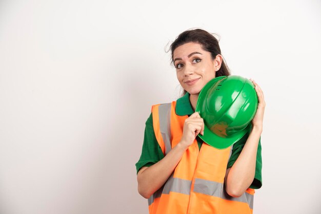 Female construction site engineer with helmet . High quality photo