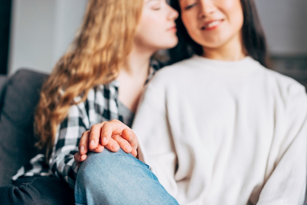 Female couple holding hands