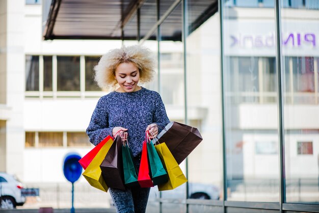 Female customer walking on city street