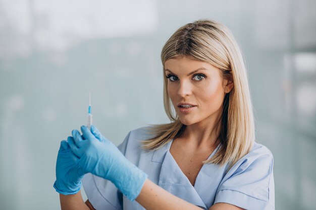 Female dermatologist with prick in hands