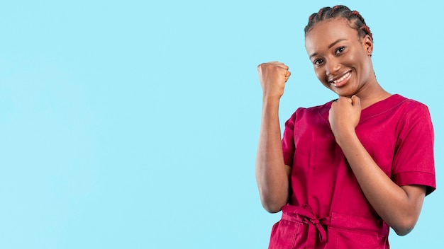 Free photo female doctor being happy and cheering