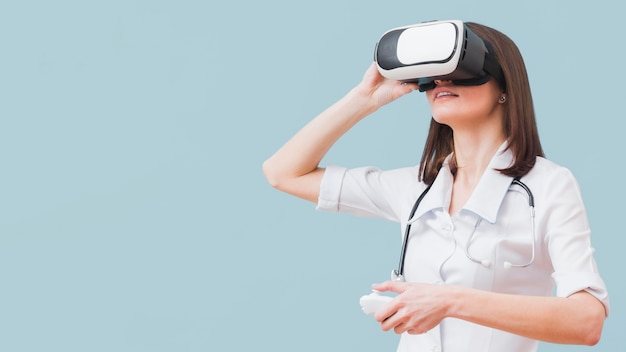 Female doctor experiencing virtual reality