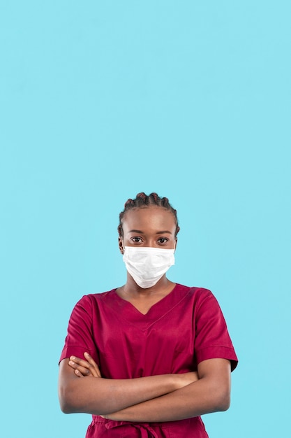 Female doctor having her arms crossed