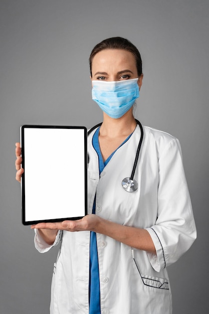 Female doctor at hospital wearing mask