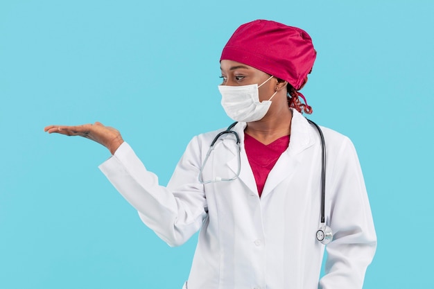 Female doctor looking at her hand