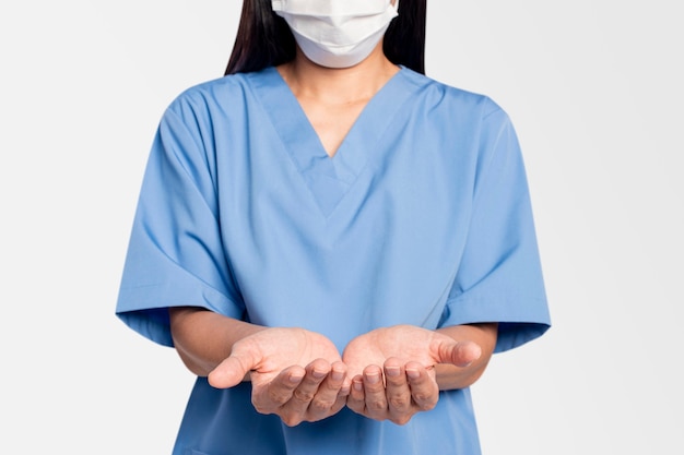 Free photo female doctor showing a support hand gesture