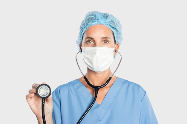 Female doctor using a stethoscope portrait