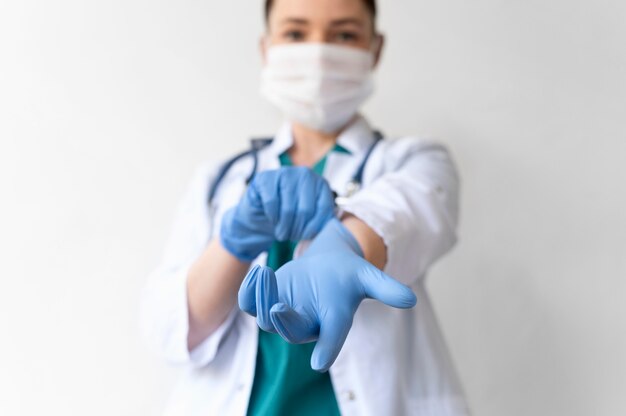 Female doctor wearing a medical protective equipment