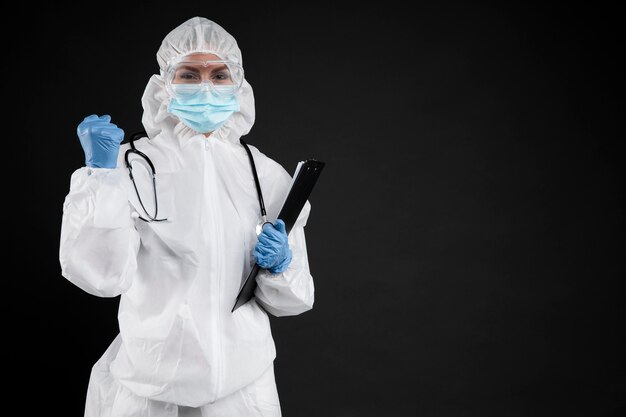 Female doctor wearing pandemic medical equipment