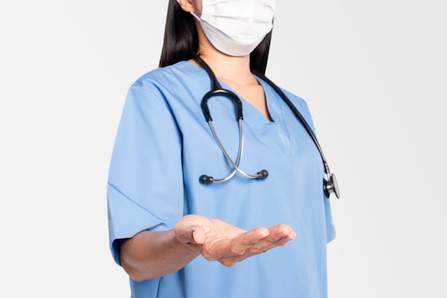 Female doctor with a presenting hand gesture