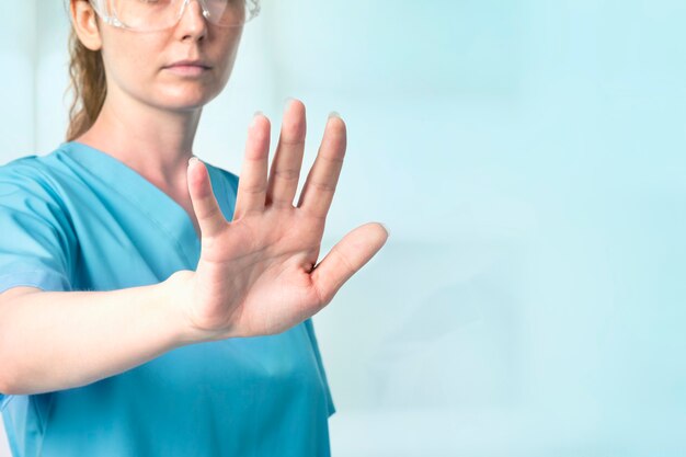 Female doctor  with smart glasses touching virtual screen medical technology