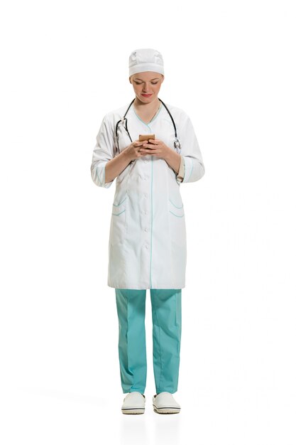 Female doctor with smartphone. Health concept