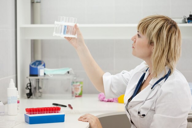 Female doctor with test tube