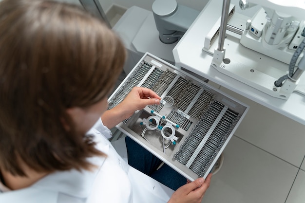 Female doctor working in her ophthalmology clinic