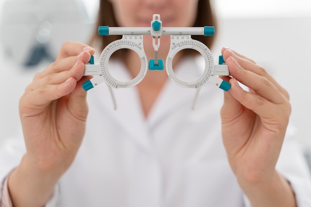 Female doctor working in her ophthalmology clinic