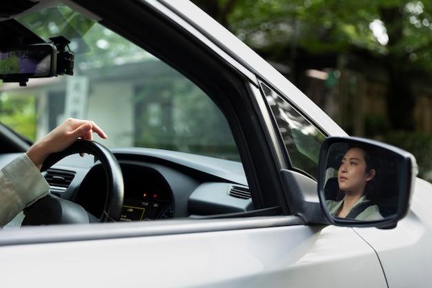 Female driver in electric car