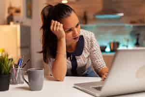 Free photo female entrepreneur reading emails