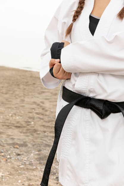 Female fighter in martial art costume