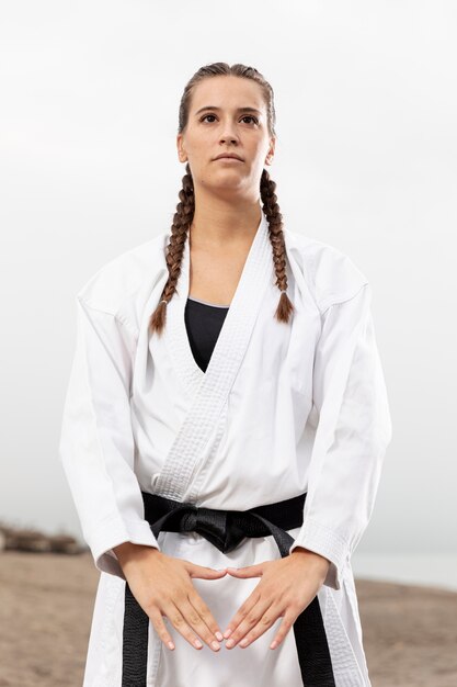 Female fighter in martial arts costume