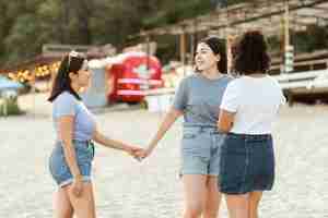 Free photo female friends having fun at the beach