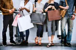 Free photo female friends out shopping together