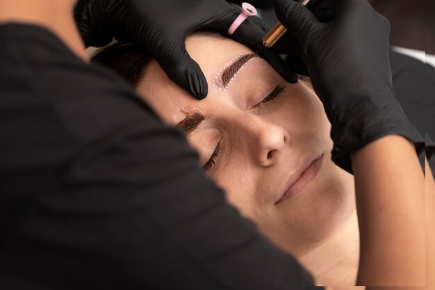 Female going through a microblading treatment