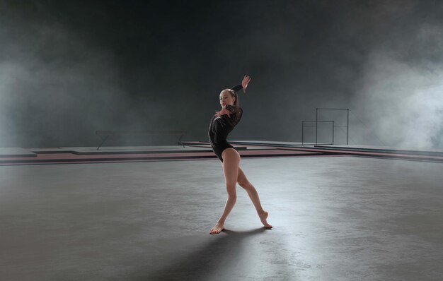 Female gymnast doing a complicated trick