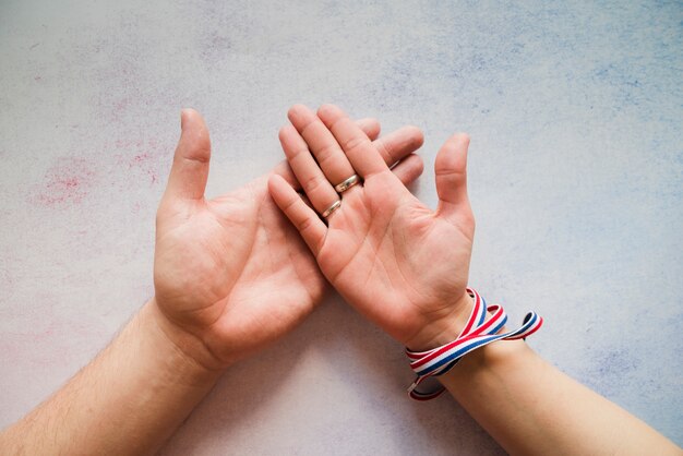 Female hand in male hand