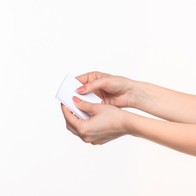 Female hands holding blank paper for records