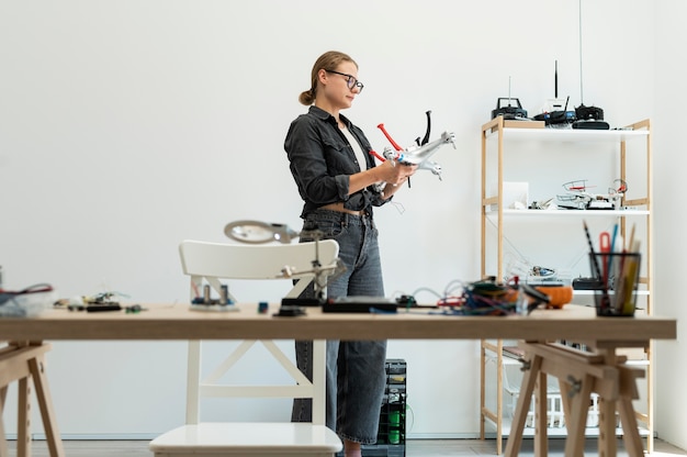 Female inventor working at a new creation