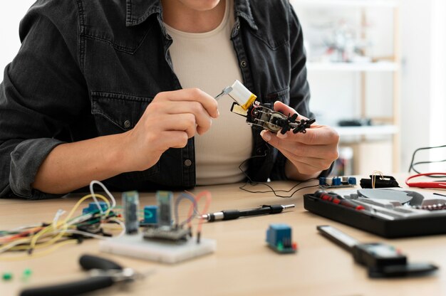 Female inventor working at a new creation