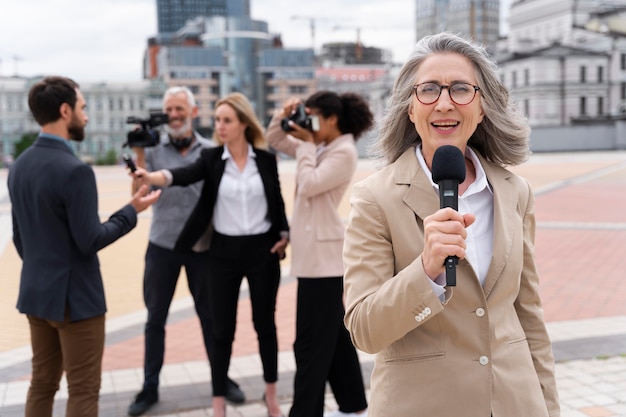 Female journalist telling the news