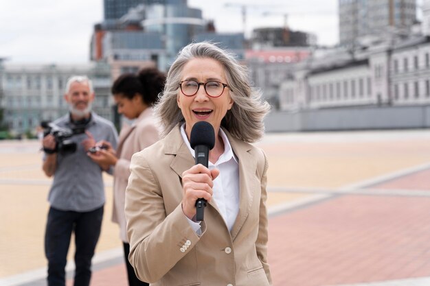 Female journalist telling the news