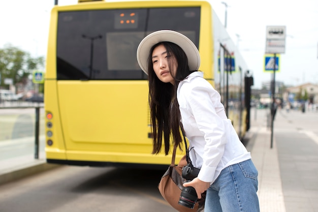 Female local traveler with a camera