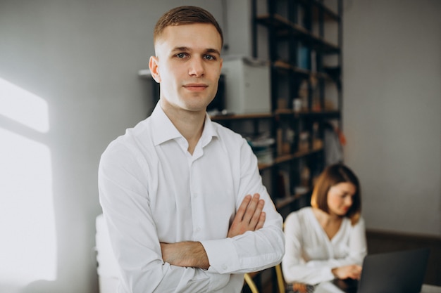 Female and male collegues working in office