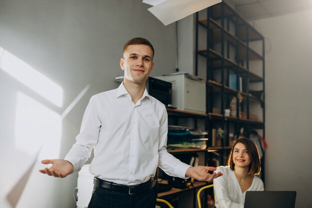 Female and male collegues working in office