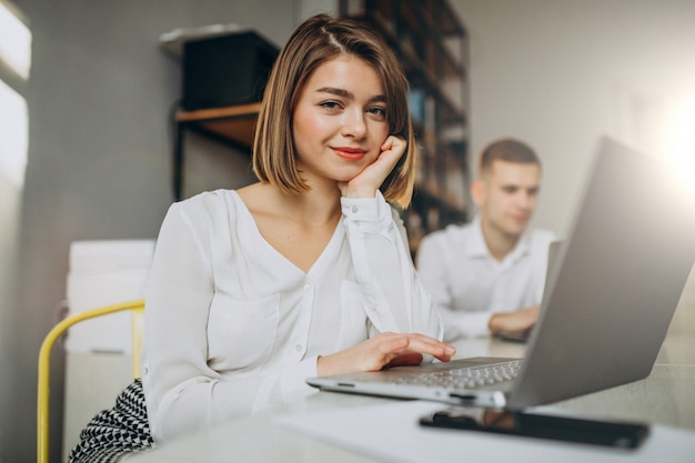 Female and male collegues working in office