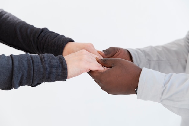 Female and male hands holding together