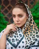 Free photo female model in animal print hijab