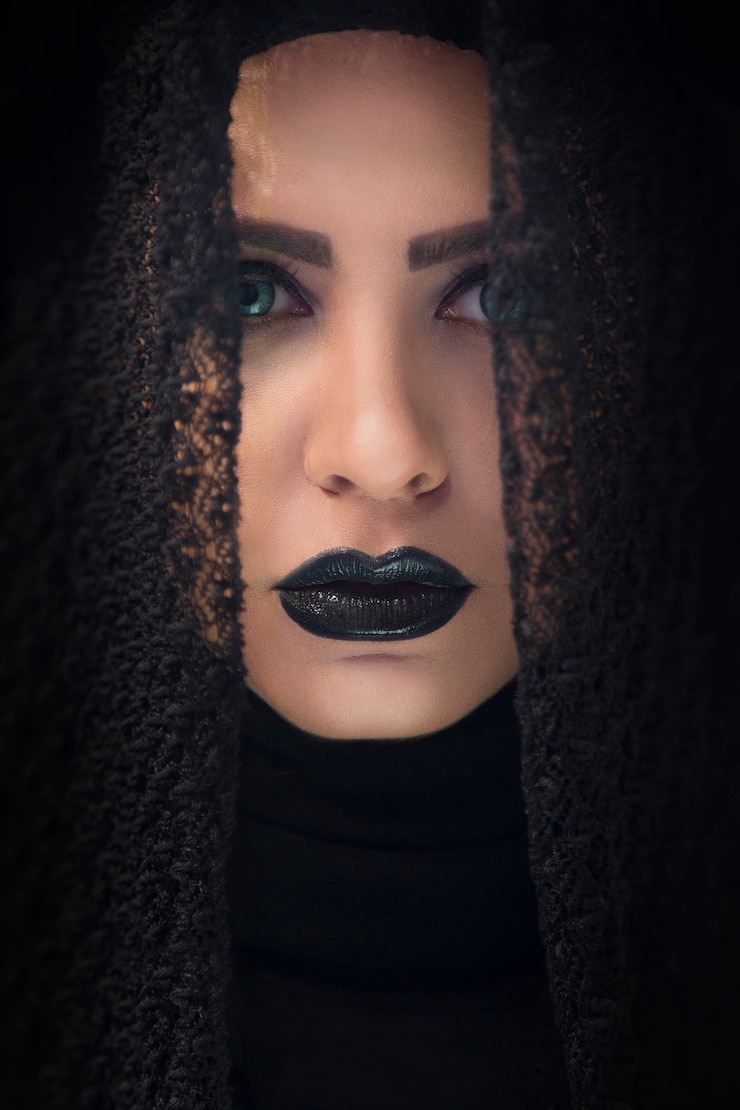 Free Photo female model in gothic lace shawl and purple lipstick