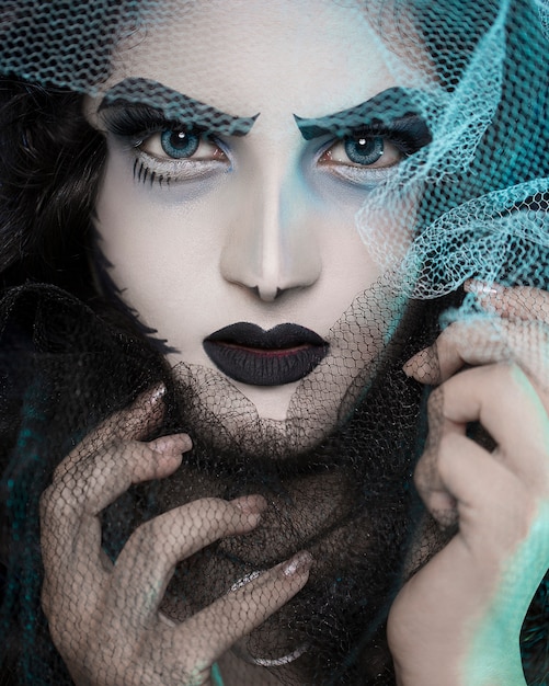 Female model in vampire style makeup