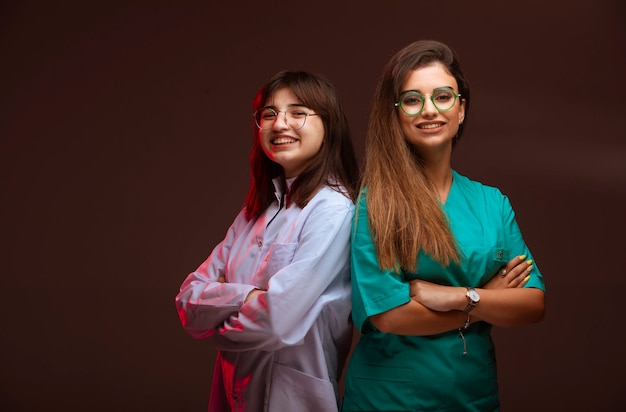 Female nurse and doctor look professional. 